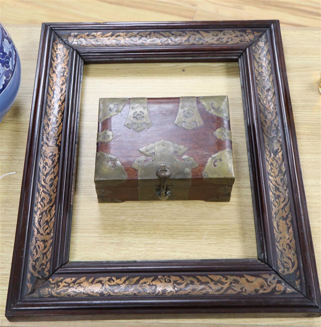 A Chinese padouk frame with inlaid zodiac symbolism, 58 x 48cm and a Chinese brass-mounted box with turtle lock, width 23cm
